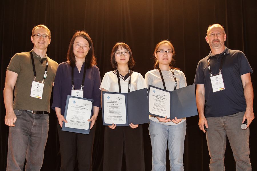 Shan Lu, Junwen Yang and Chengcheng Wan receive their Distinguished Paper Award at ICSE. (Photo courtesy ACM/IEEE)