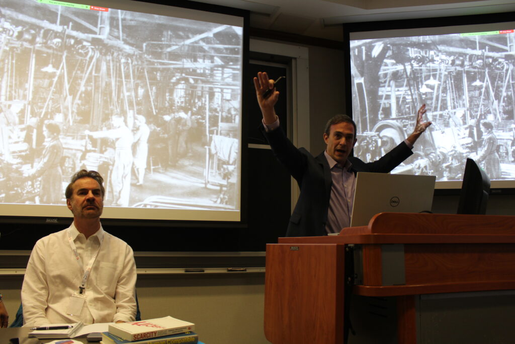 Erik Brynholffson (left) from the Stanford Institute on the Digital Economy and Avi Goldfarb (right) from the Creative Destruction Lab at the University of Toronto speak at "The 4th Industrial Revolution" panel.