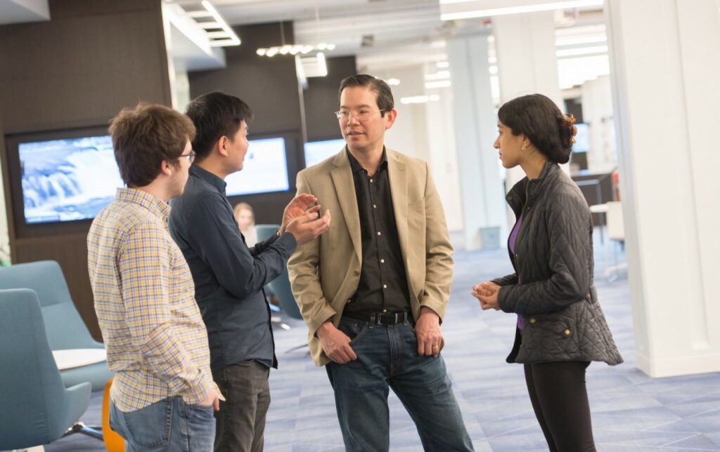 Professor Fred Chong advising students