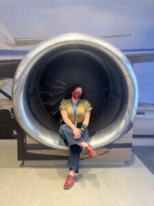 Garcia sitting in a jet engine