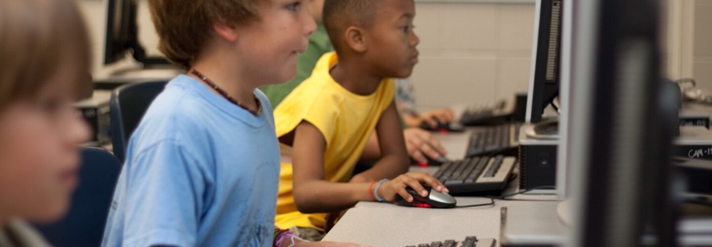 Young students on computers